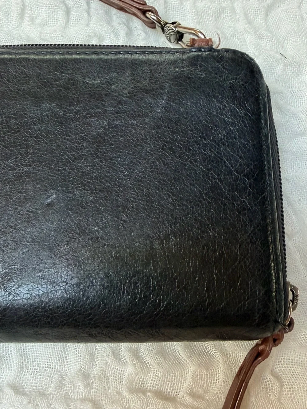 The Sak Smartphone Black and Brown Leather Wristlet